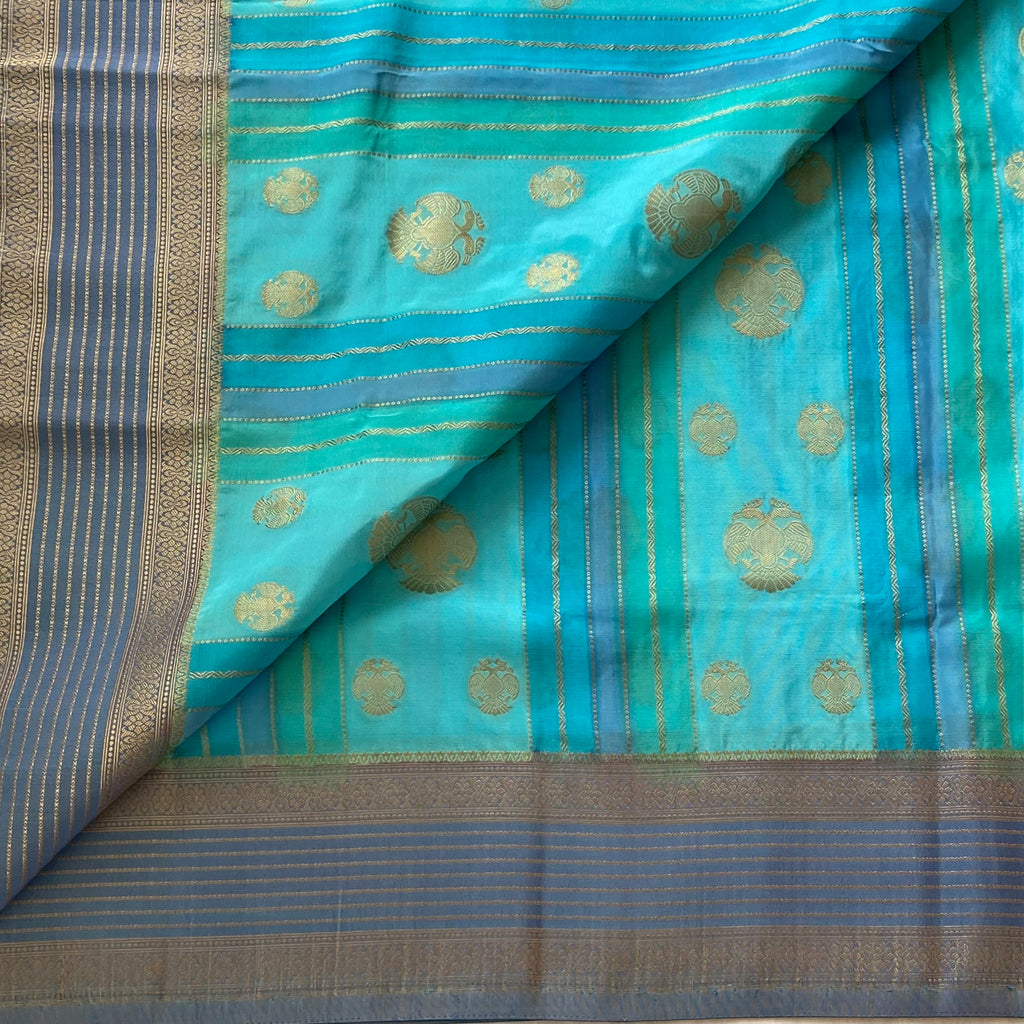 Turquoise With Slate Blue Soft Crepe Silk With Designer Gandaberunda Weave