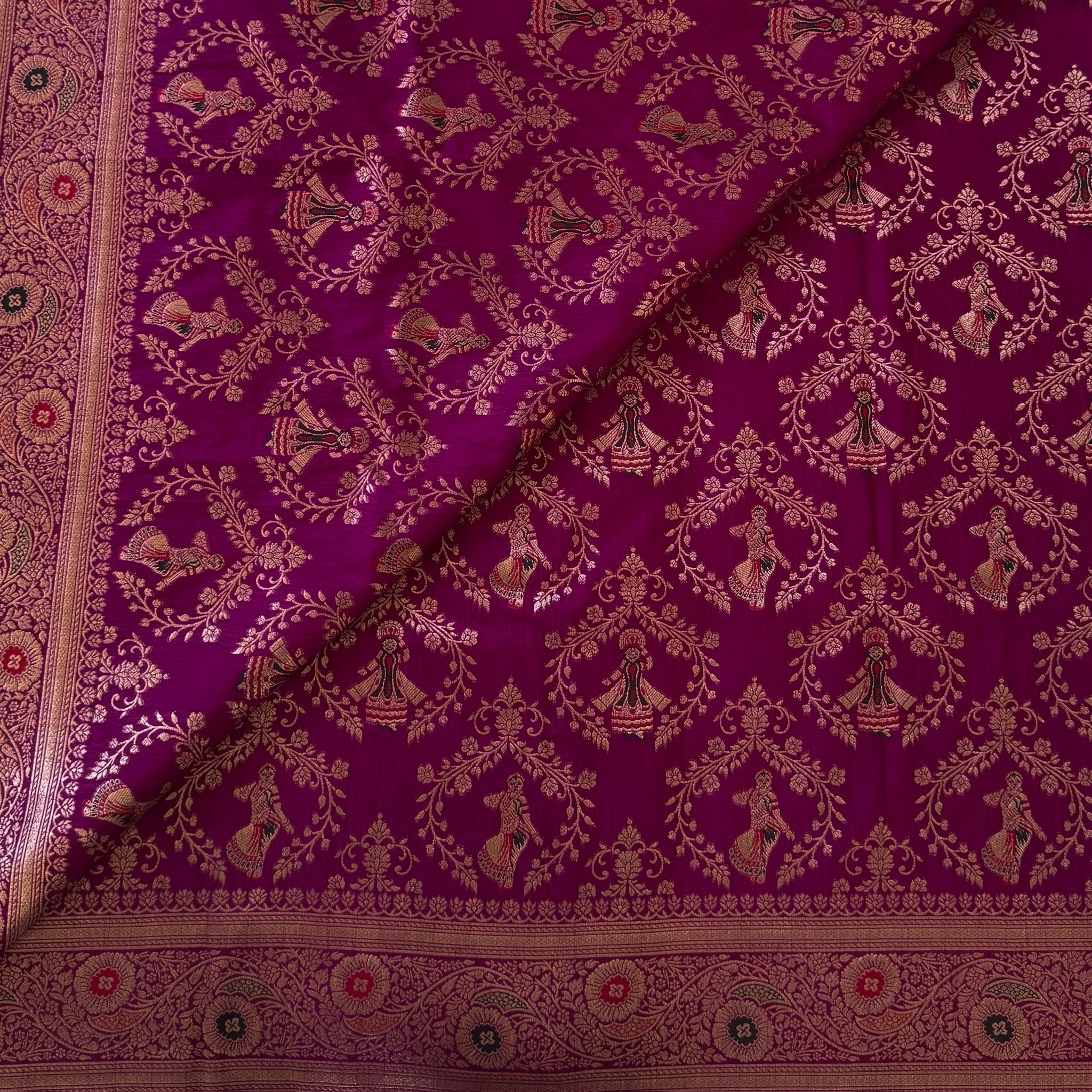 Magenta Gold Brocade Saree with Elephant Dancer Motifs and Tassels