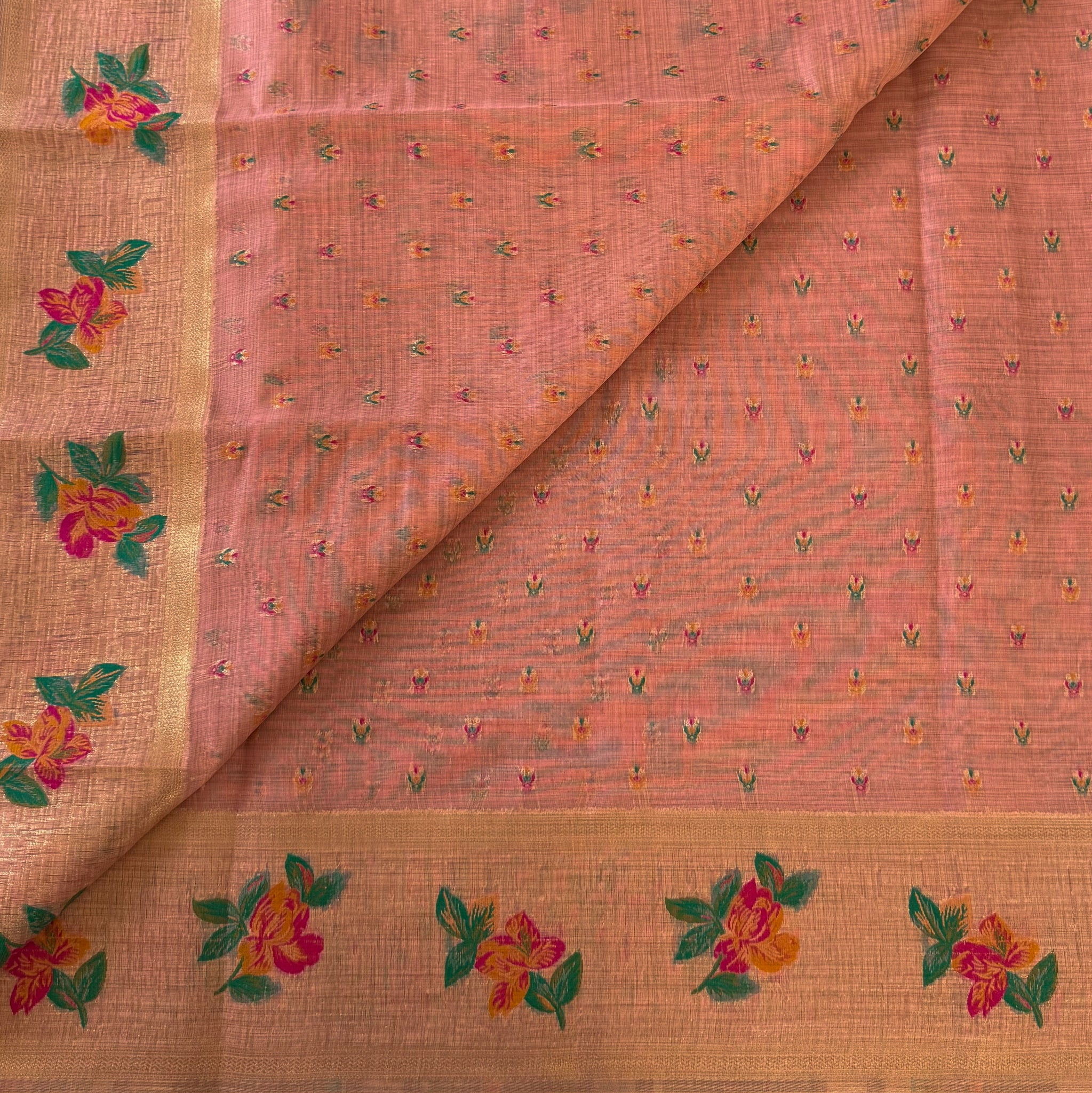 Coral Peach Floral Saree with Golden Border Tassel Pallu