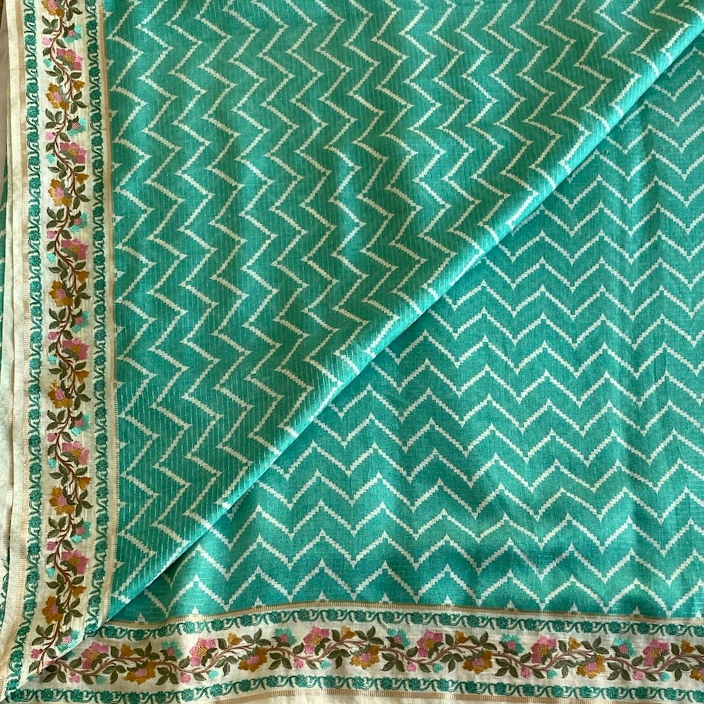 Turquoise Soft Tussar Silk Saree With Cream Floral Border
