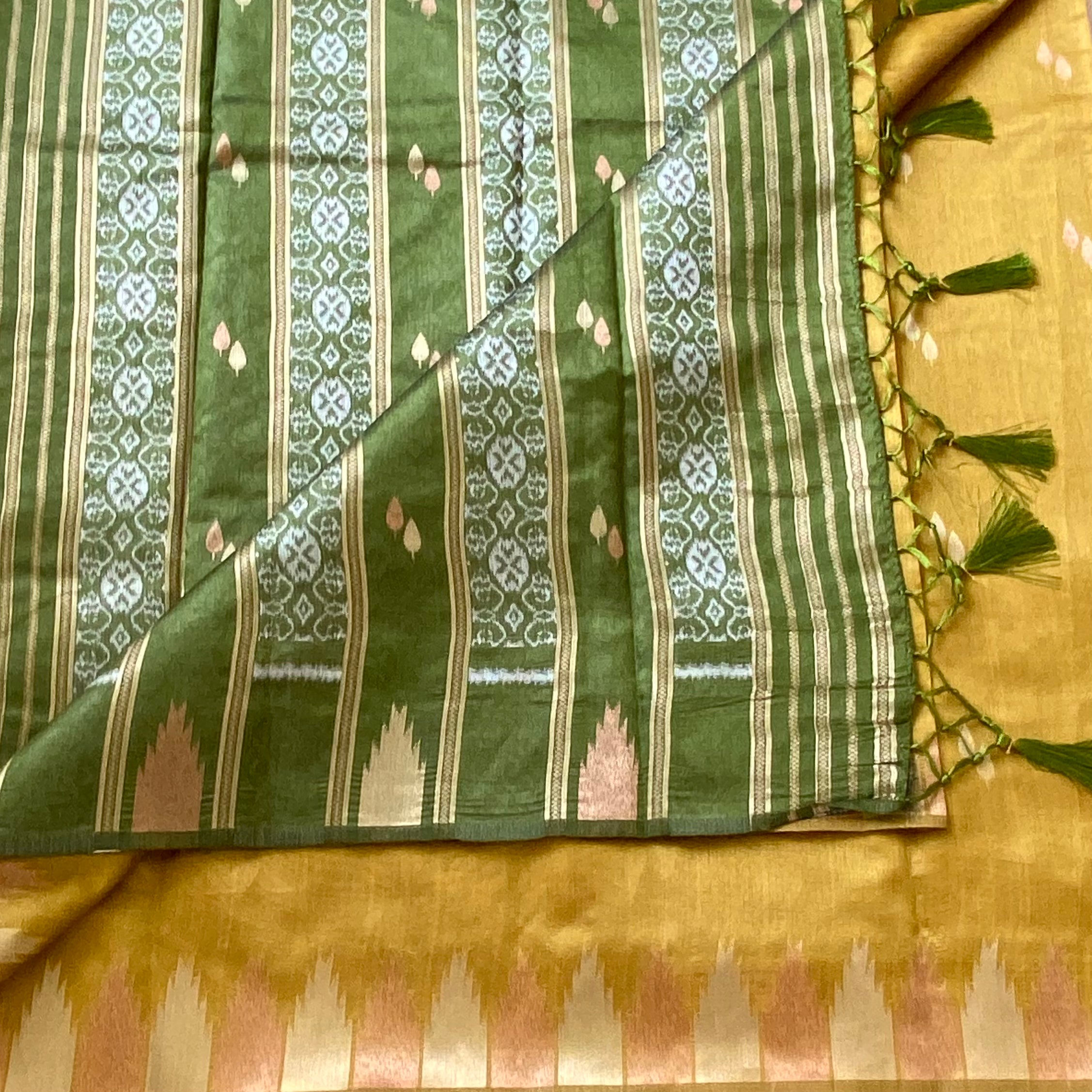 Mustard gold soft tussar with olive green ikkat pallu & temple borders
