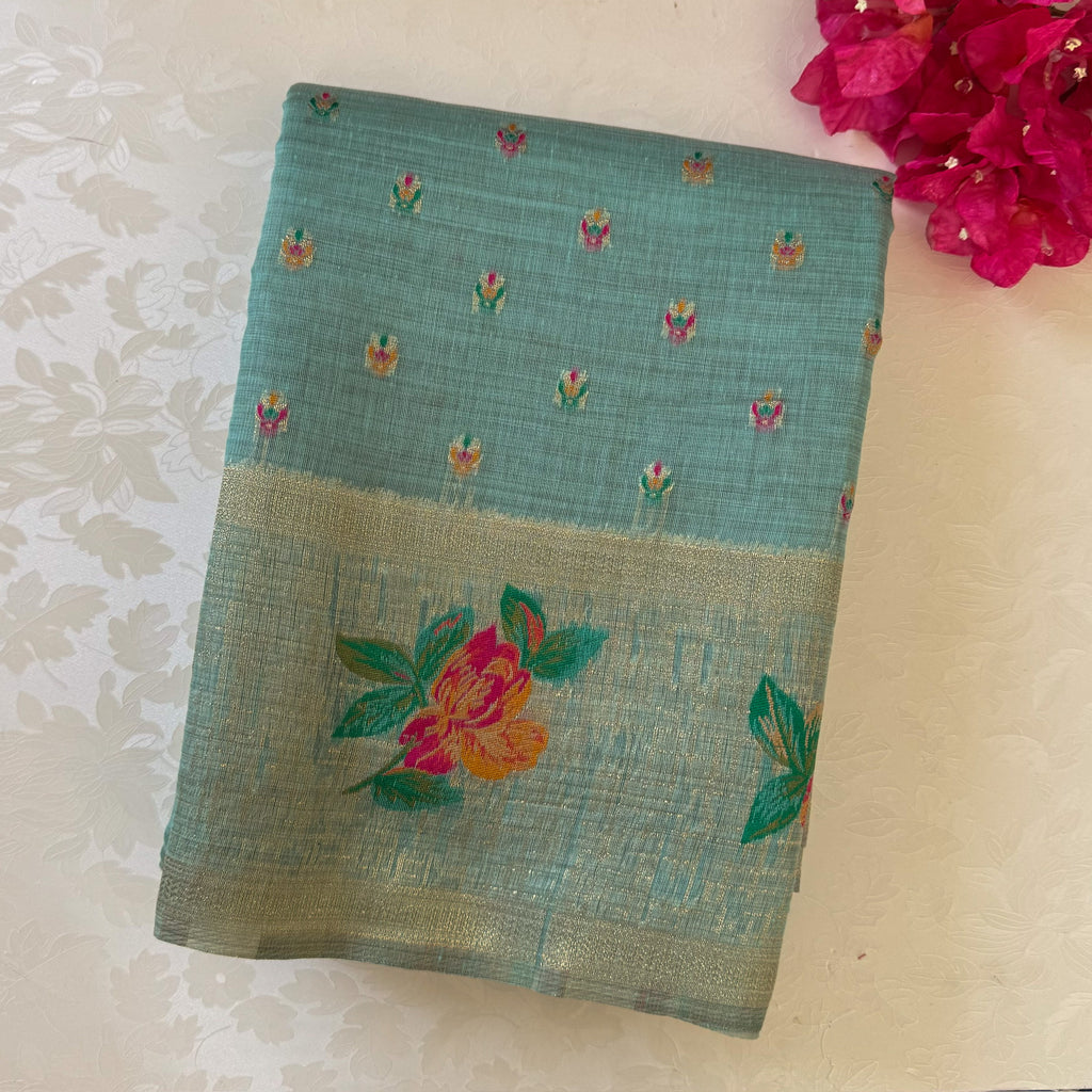 Festive Elegant Mint Green Floral Saree With Gold Zari Tassels