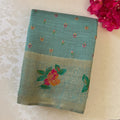 Festive Elegant Mint Green Floral Saree With Gold Zari Tassels