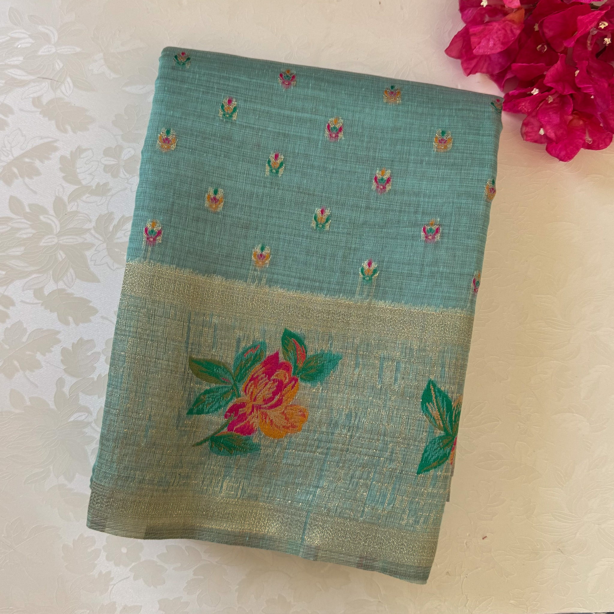 Festive Elegant Mint Green Floral Saree With Gold Zari Tassels