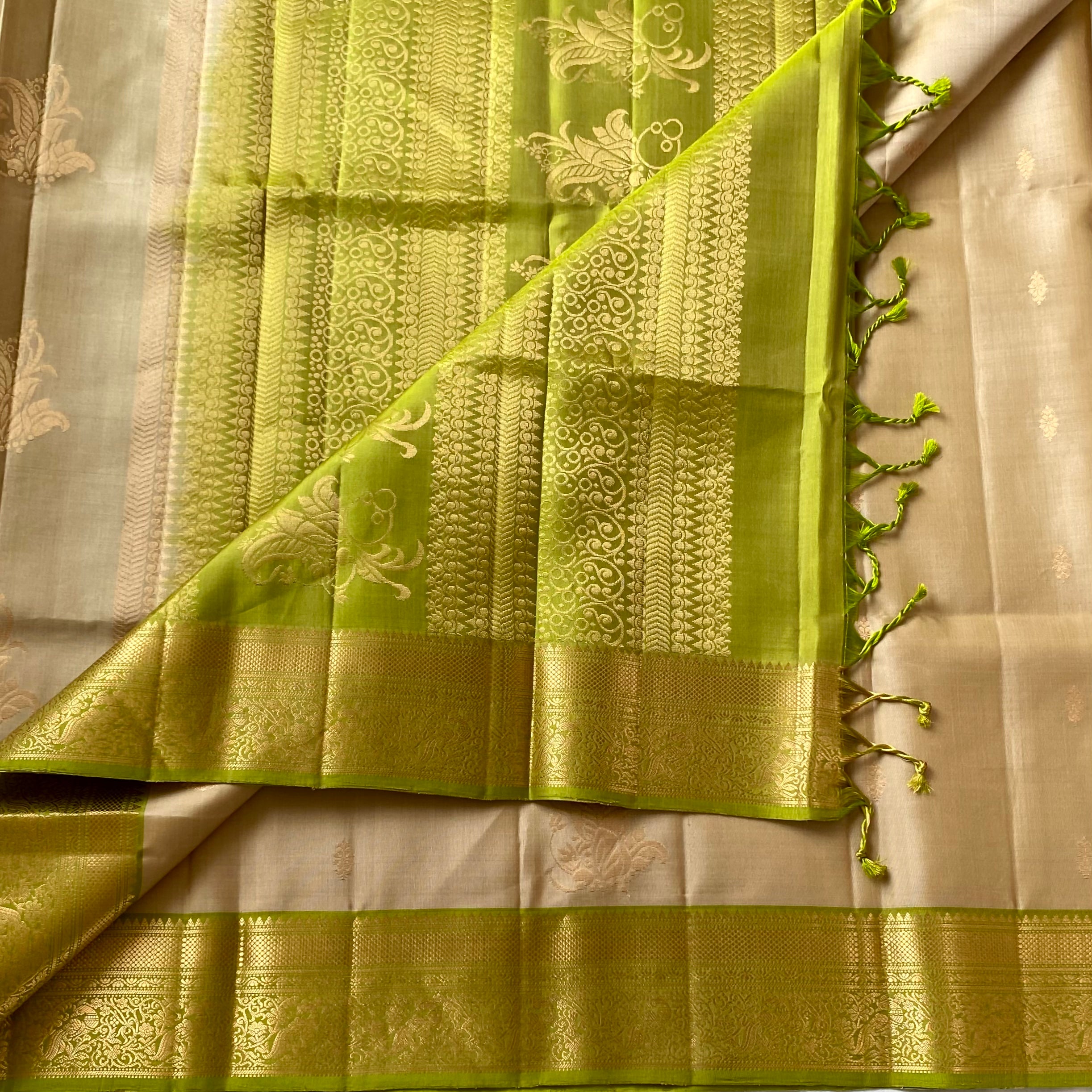 Elegant Pale Beige Lime Green Zari Woven Floral Traditional Saree