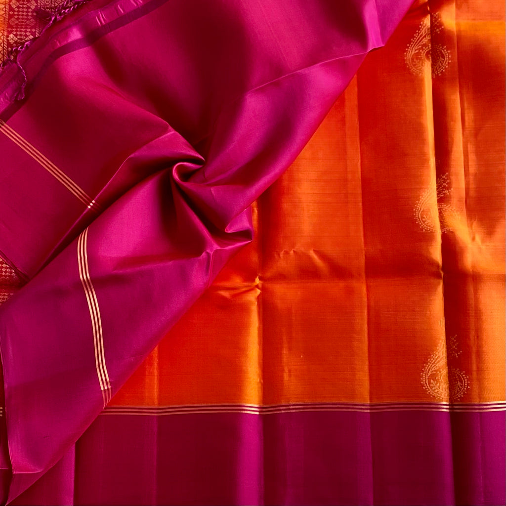 Sunset Orange Designer Pure Silk Saree With Rich Magenta Pink Pallu And Gold Zari