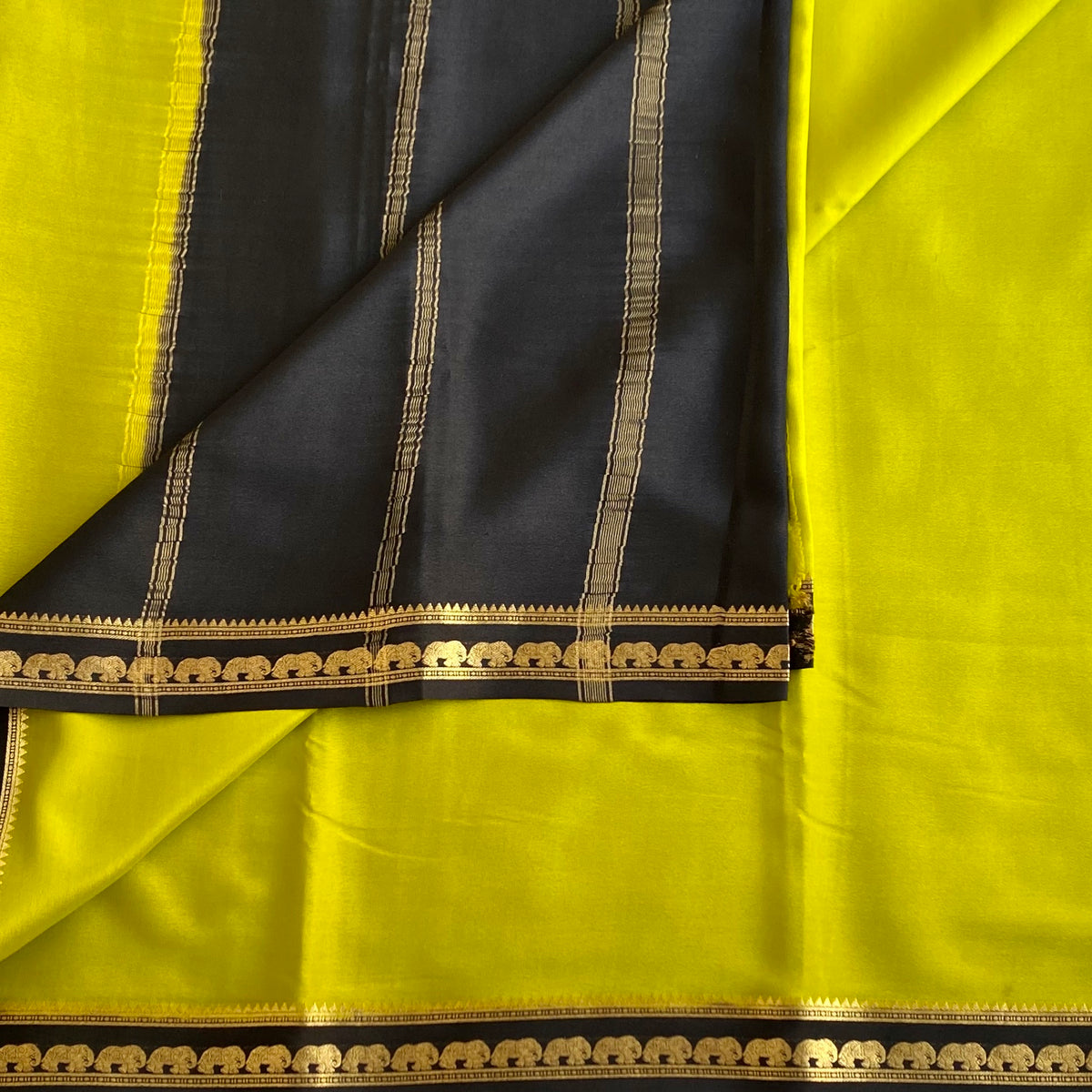 Chartreuse Green Mysore Crepe Silk Saree With Charcoal Black Elephant Border