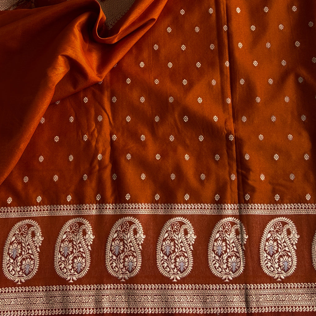 Rust Orange soft tussar with antique zari paisley weave