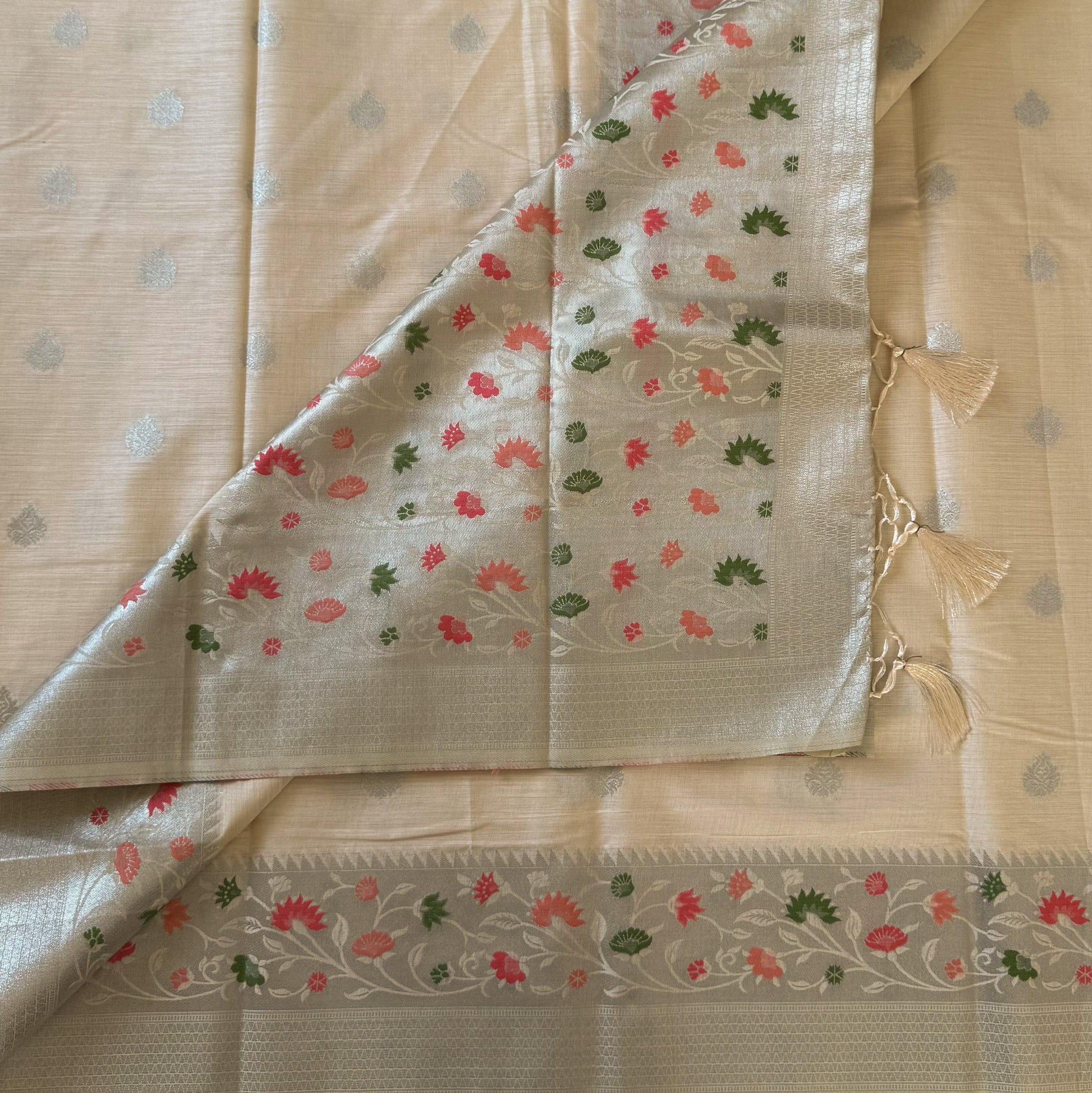 Cream Silver Floral Saree with Tassel Pallu for Festive Occasions