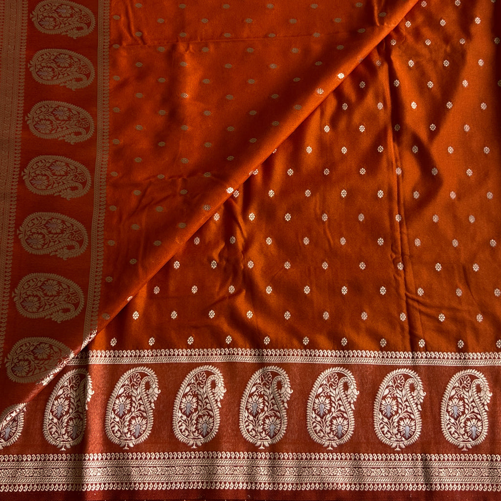 Rust Orange soft tussar with antique zari paisley weave