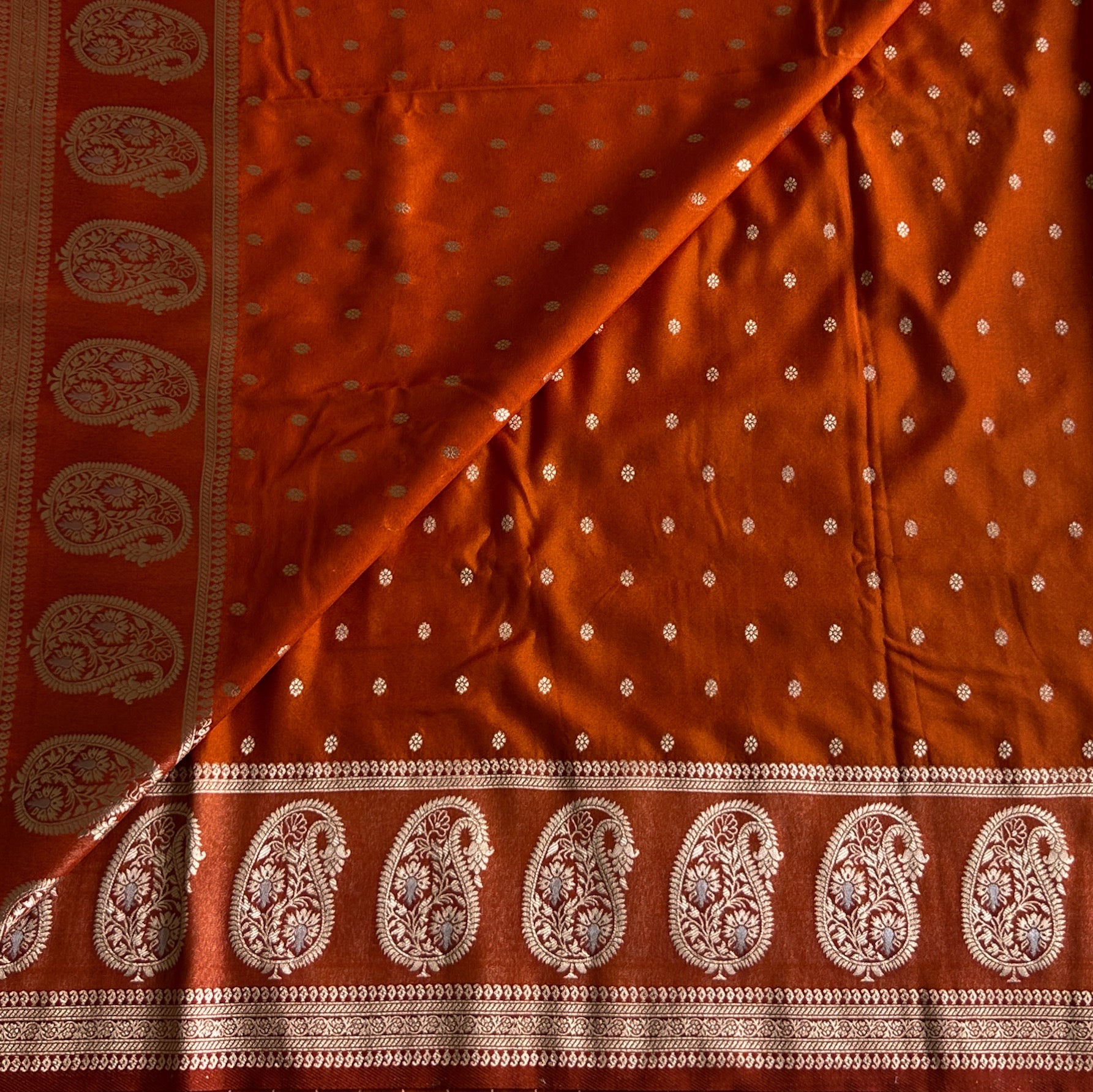 Rust Orange soft tussar with antique zari paisley weave