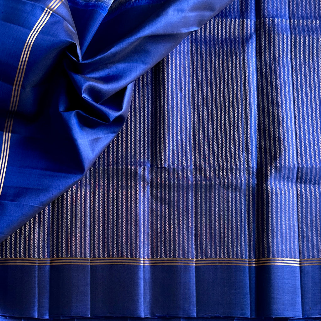 Cobalt Blue Zari Striped Saree With Gold Border And Tassels