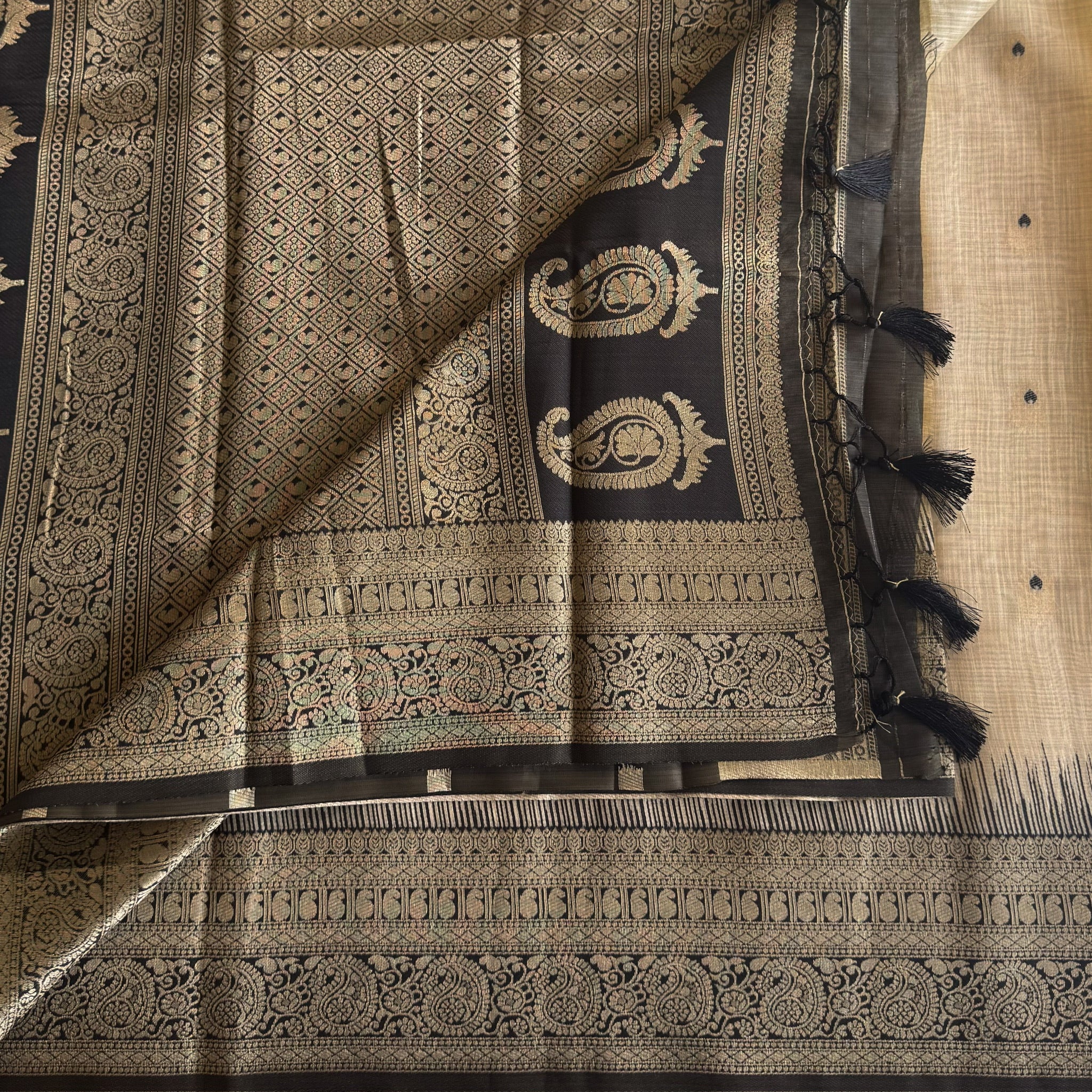 Beige Black Brocade Saree With Gold Paisley Pallu And Tassels