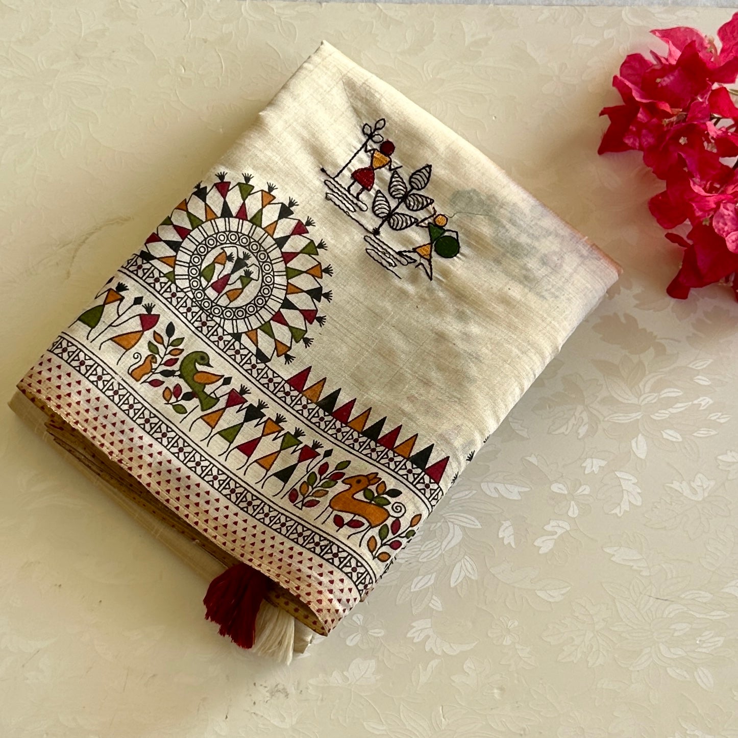 Cream Folk Printed Saree With Maroon Tassel Border For Festivals