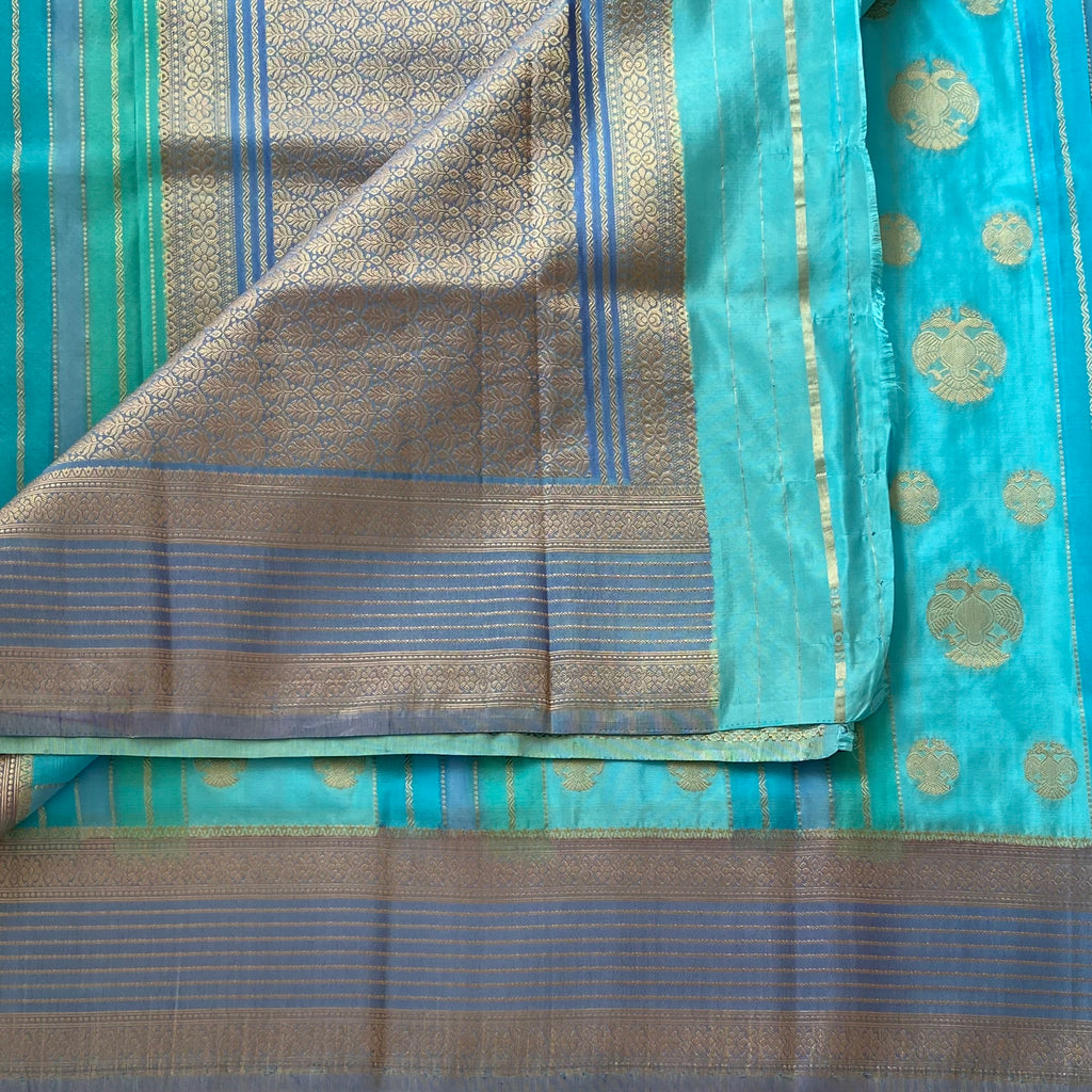 Turquoise With Slate Blue Soft Crepe Silk With Designer Gandaberunda Weave