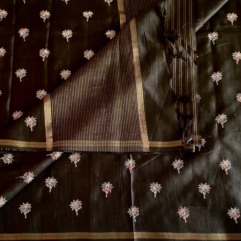 Jet Black Soft Tussar Silk Saree With Antique Gold Border And Embroidery