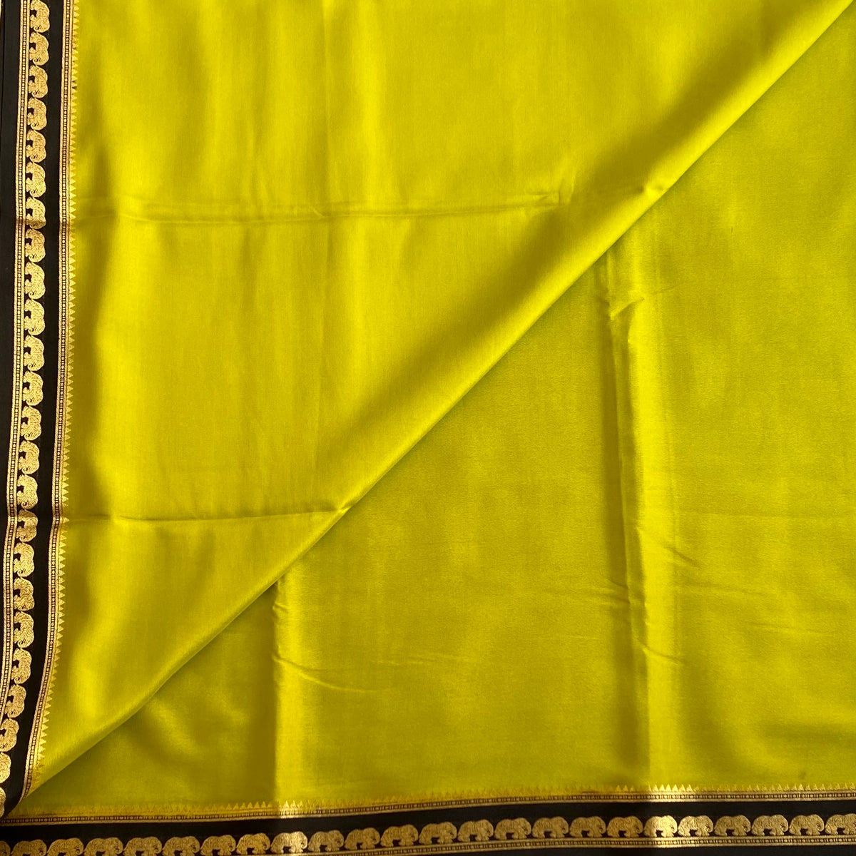 Chartreuse Green Mysore Crepe Silk Saree With Charcoal Black Elephant Border