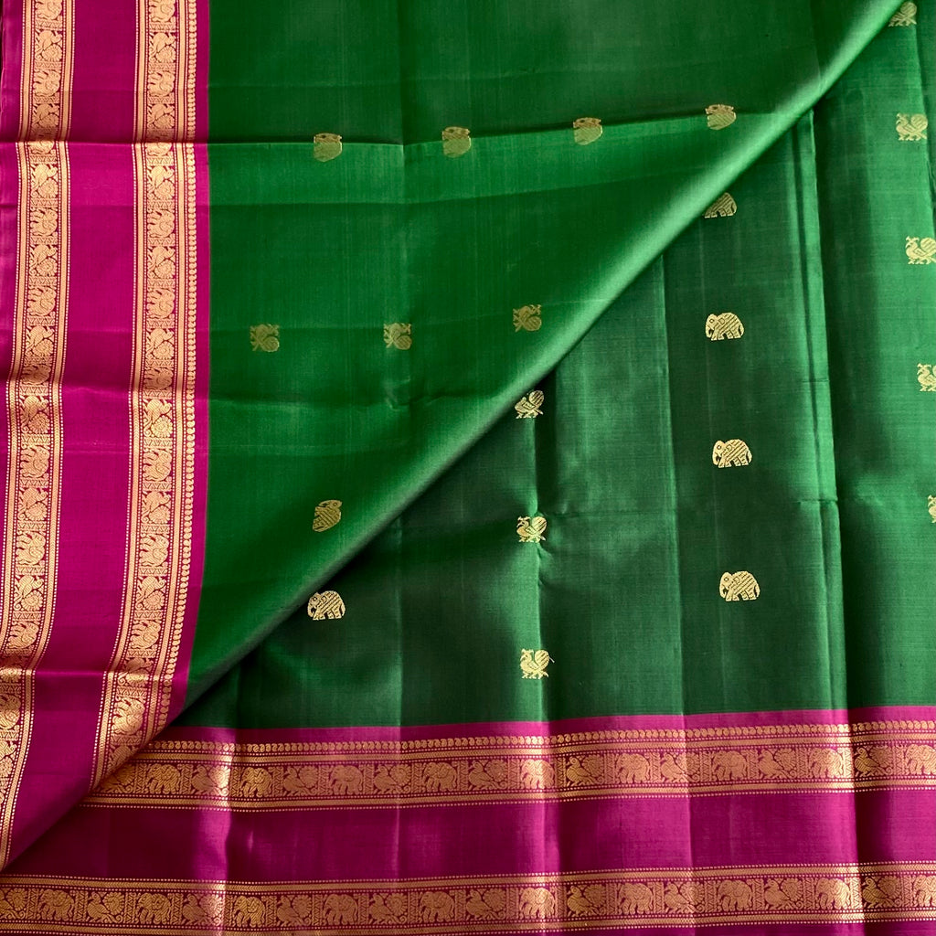 Bottle Green Designer Pure Silk Saree With Rani Pink Pallu Gold Border