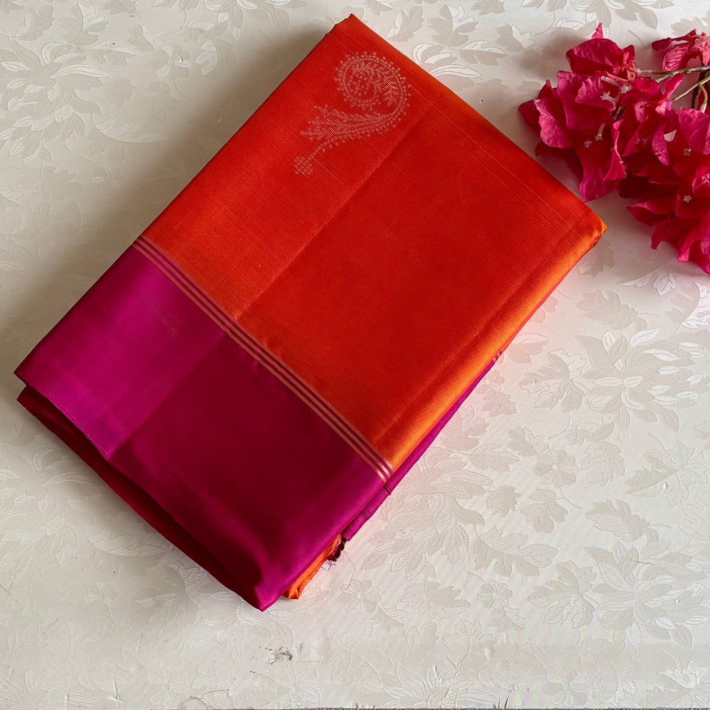 Sunset Orange Designer Pure Silk Saree With Rich Magenta Pink Pallu And Gold Zari