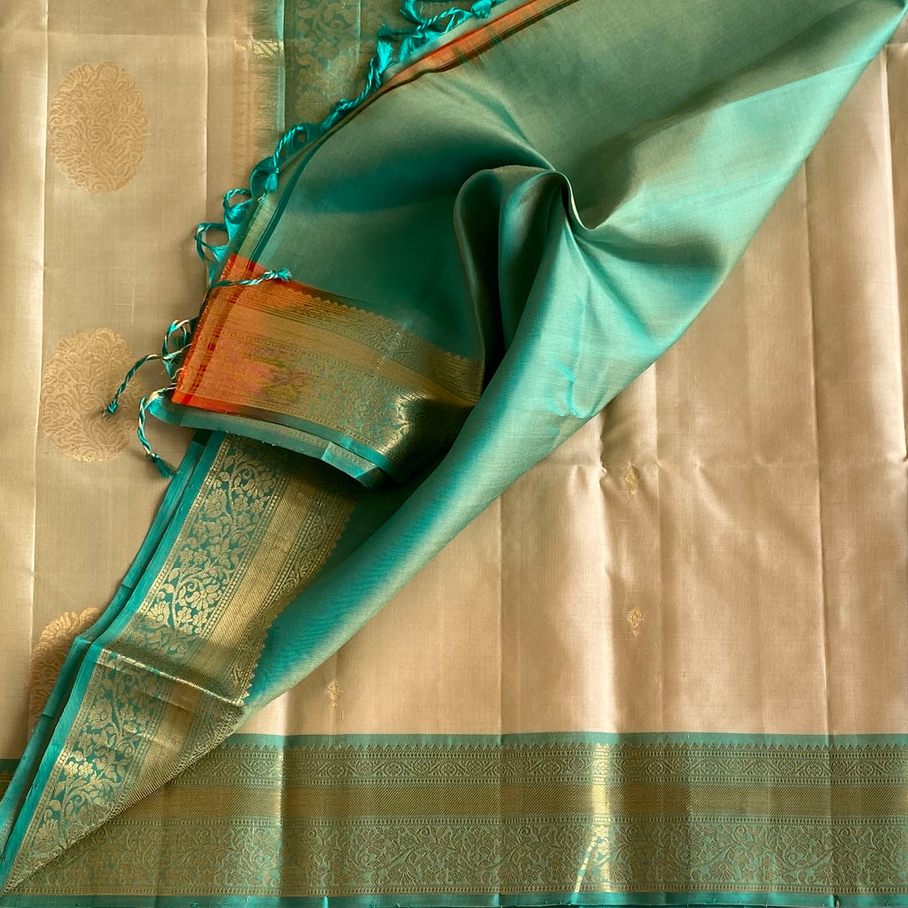 Pastel Beige Designer Pure Silk Saree With Sea Green Pallu