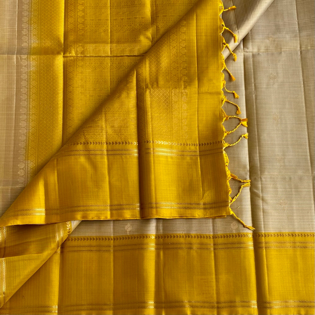 Silvery beige designer pure silk saree with mustard yellow pallu