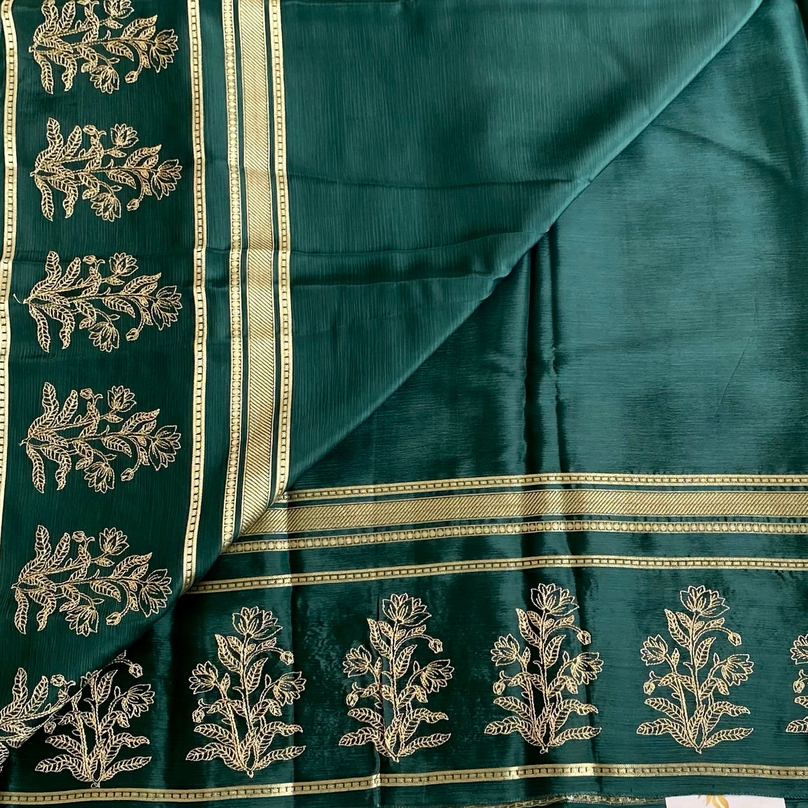 Metallic Green Green Soft Crepe Silk Saree With Metallic Gold Striped Pallu