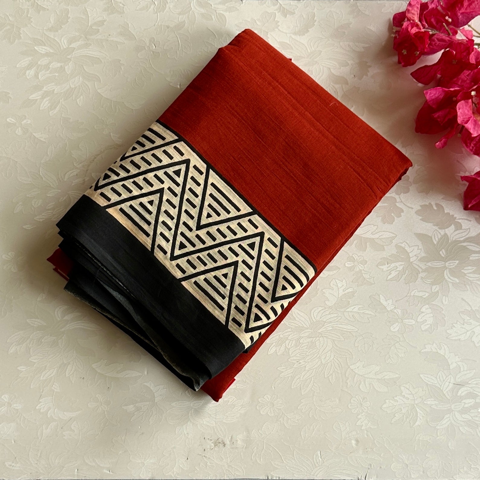 Ecru Geometric Triangle Cotton Saree Bold Rust Pallu Black Border