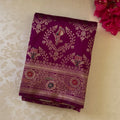 Magenta Gold Brocade Saree with Elephant Dancer Motifs and Tassels