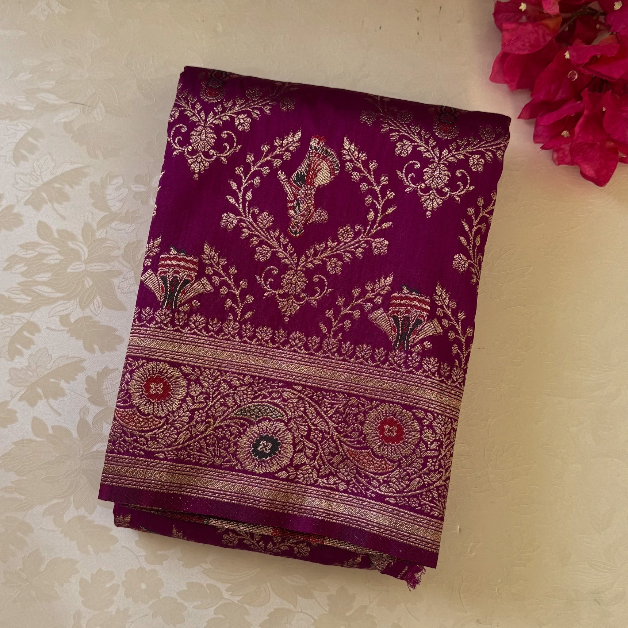 Magenta Gold Brocade Saree with Elephant Dancer Motifs and Tassels