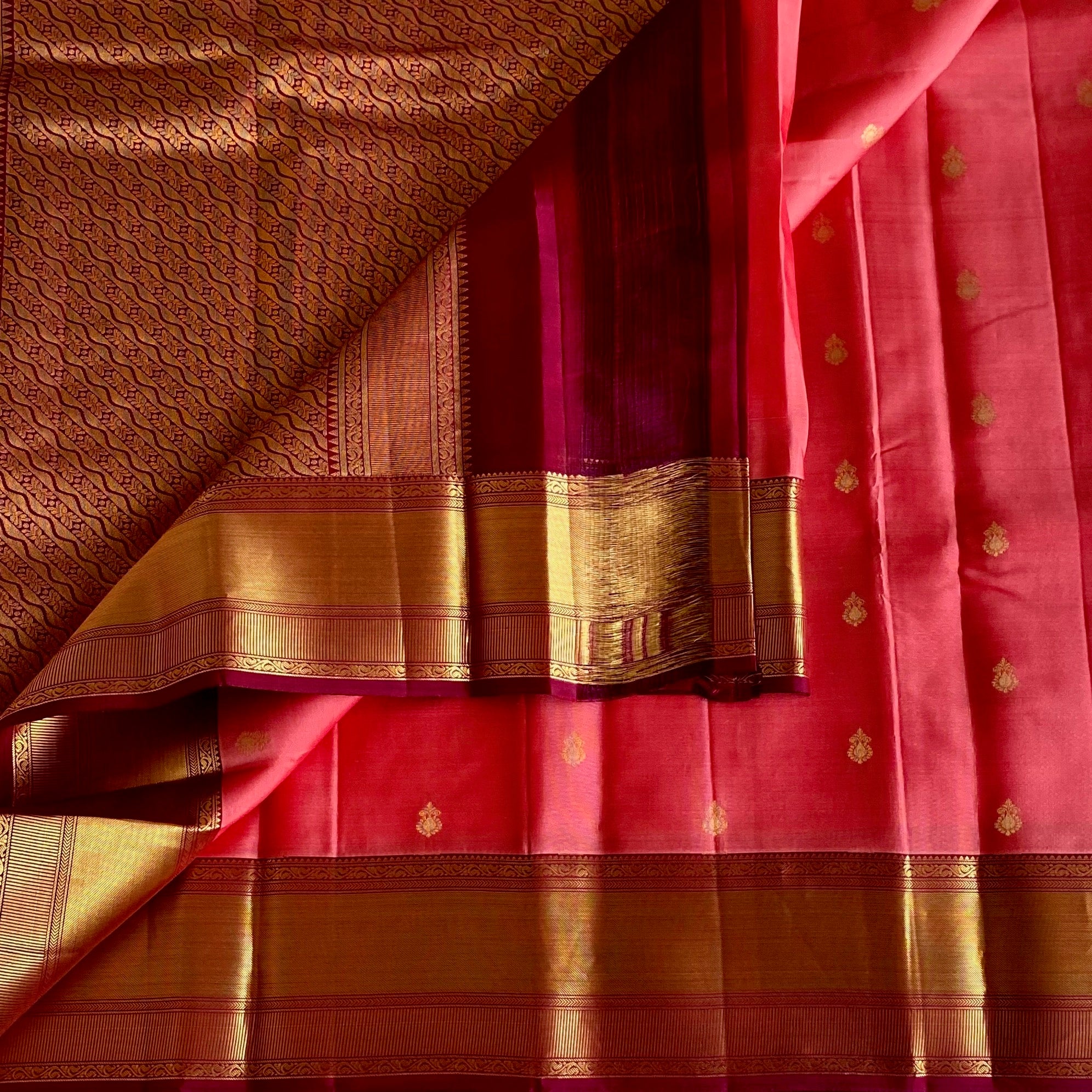 Coral Red Designer Pure Silk Saree With Maroon Pallu Metallic Gold Border
