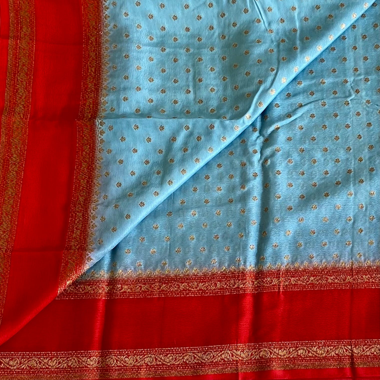 Wonder Sky Blue Banarasi Crepe Silk Saree With Scarlet Red Bordero