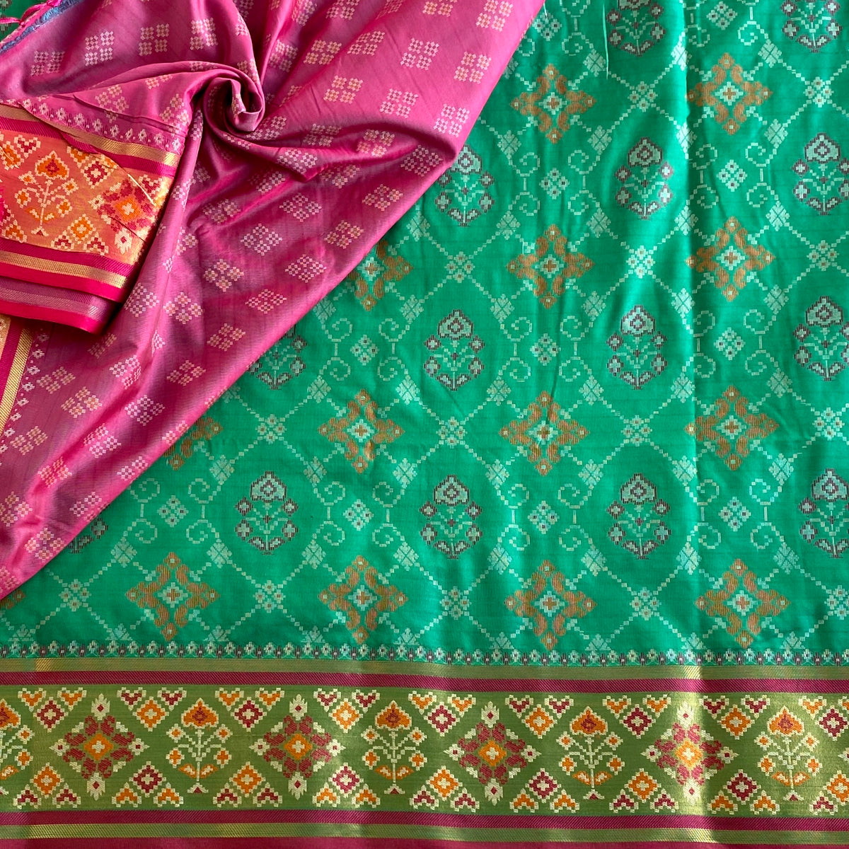 Jewel Green Patola Printed Soft Tussar Silk Saree With Raspberry Pink Pallu