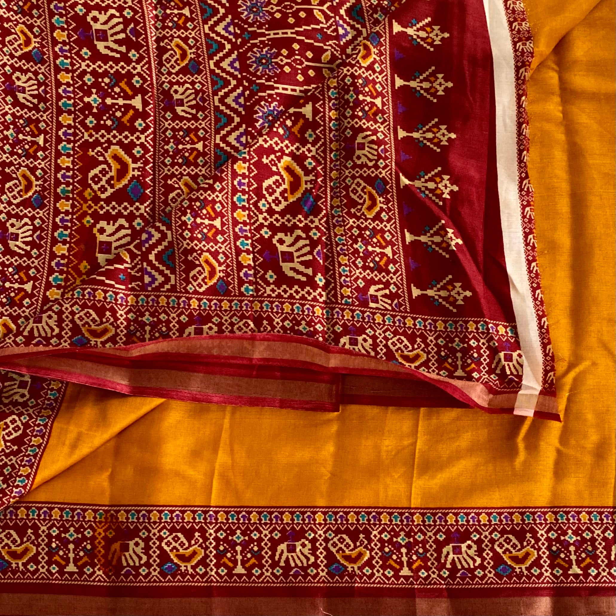 Maroon Mustard Woven Elephant Motif Saree with Golden Zari Border