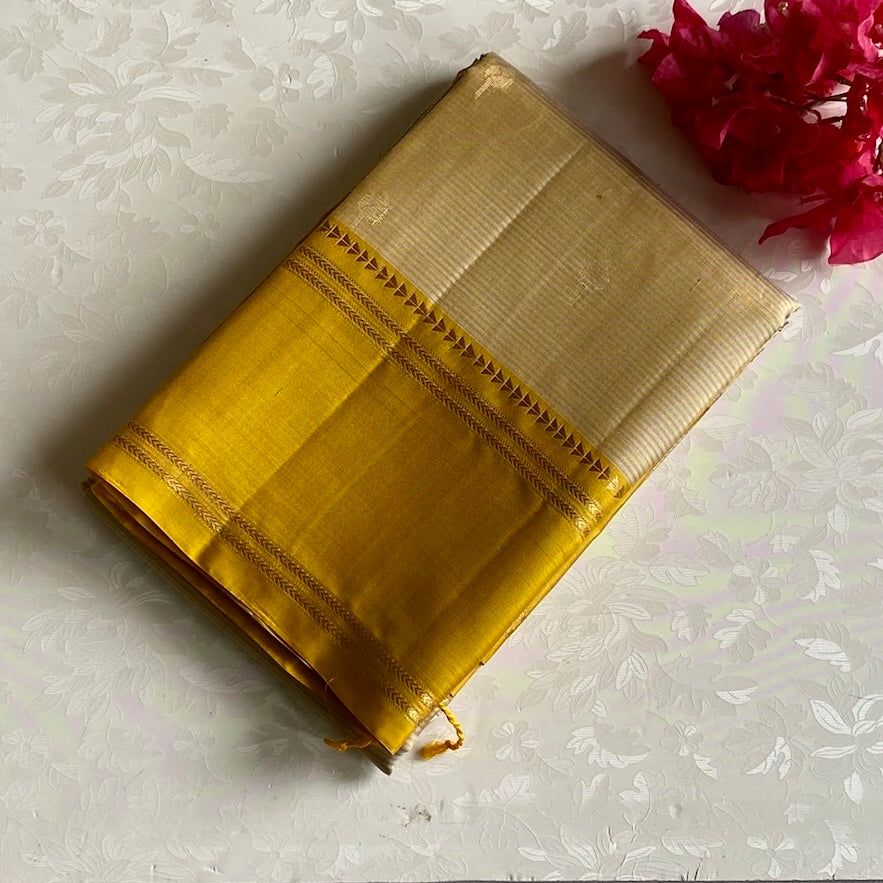 Silvery beige designer pure silk saree with mustard yellow pallu