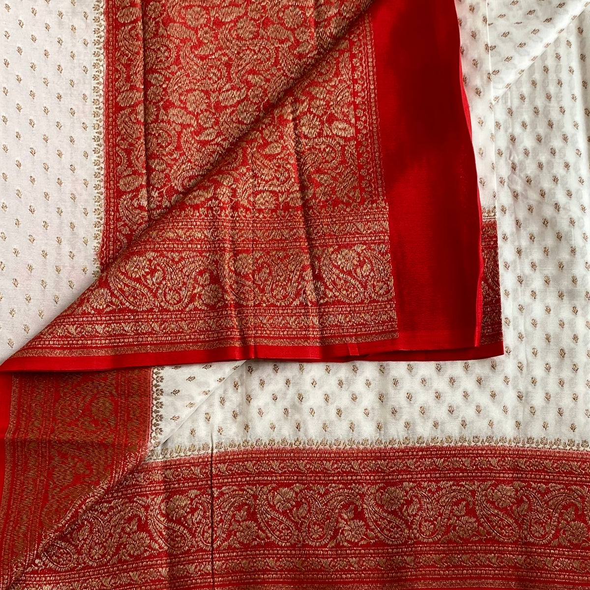 Banarasi Crepe Silk Ivory White & Scarlet Red Saree With Zari Buttas