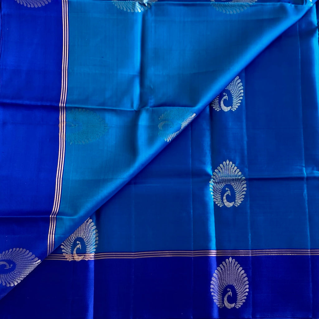 Deep Sky Designer Pure Silk With Royal Pallu & Peacock Buttas