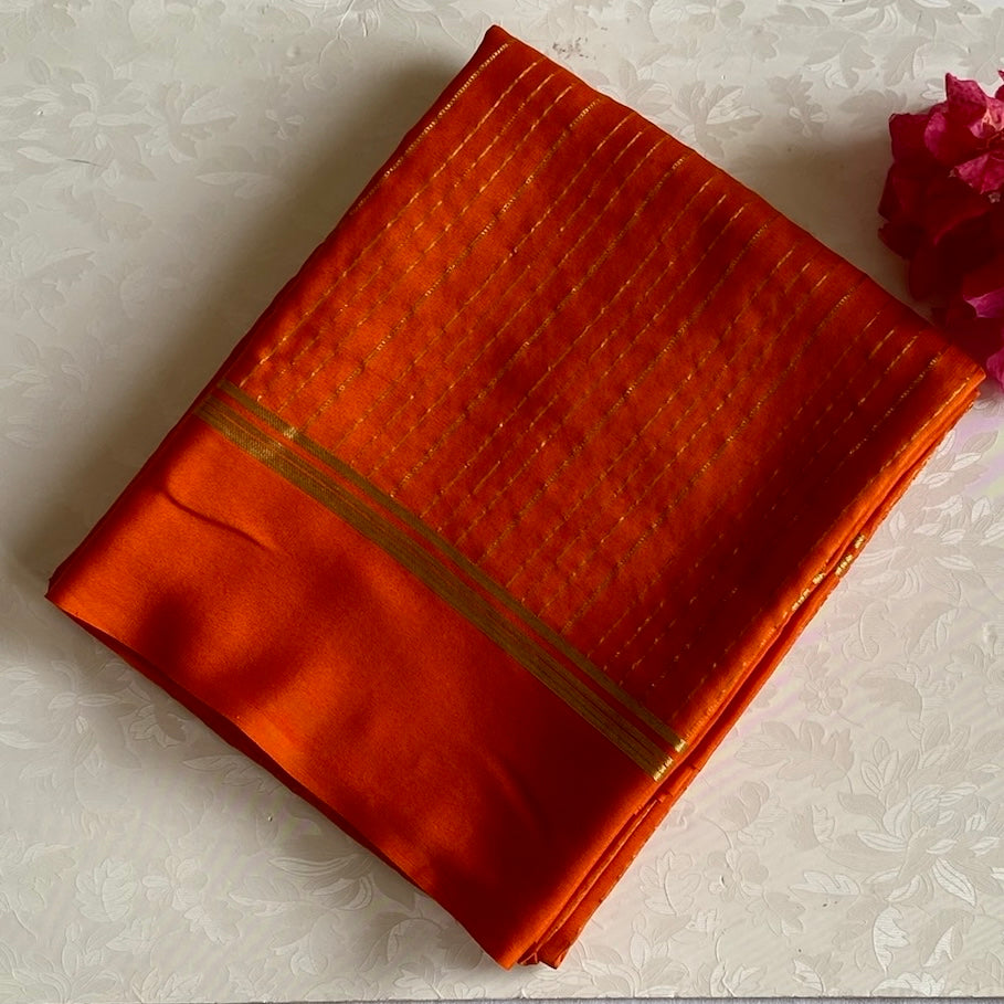 Burnt Orange Mysore Crepe Silk Saree With Metallic Gold Stripes
