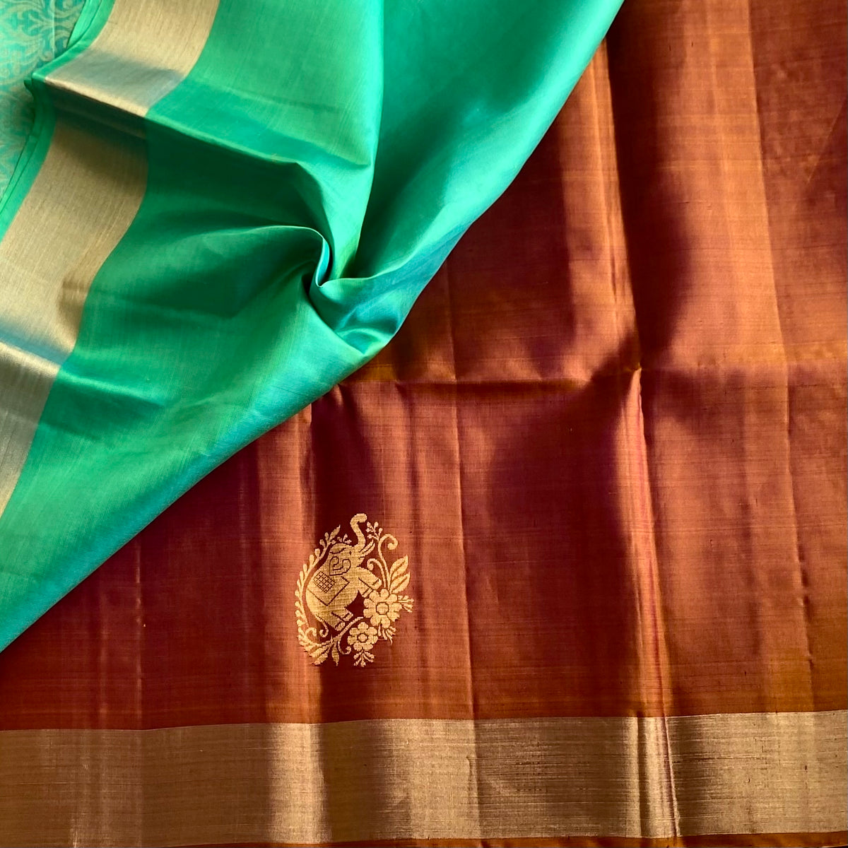 Rare Rust Designer Pure Silk Saree With Turquoise Green Pallu Gold Buta
