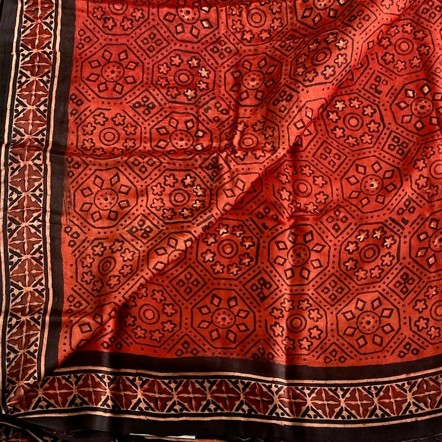 Rust Red AJRAKH Handblock Printed Silk Saree With Jet Black Pallu