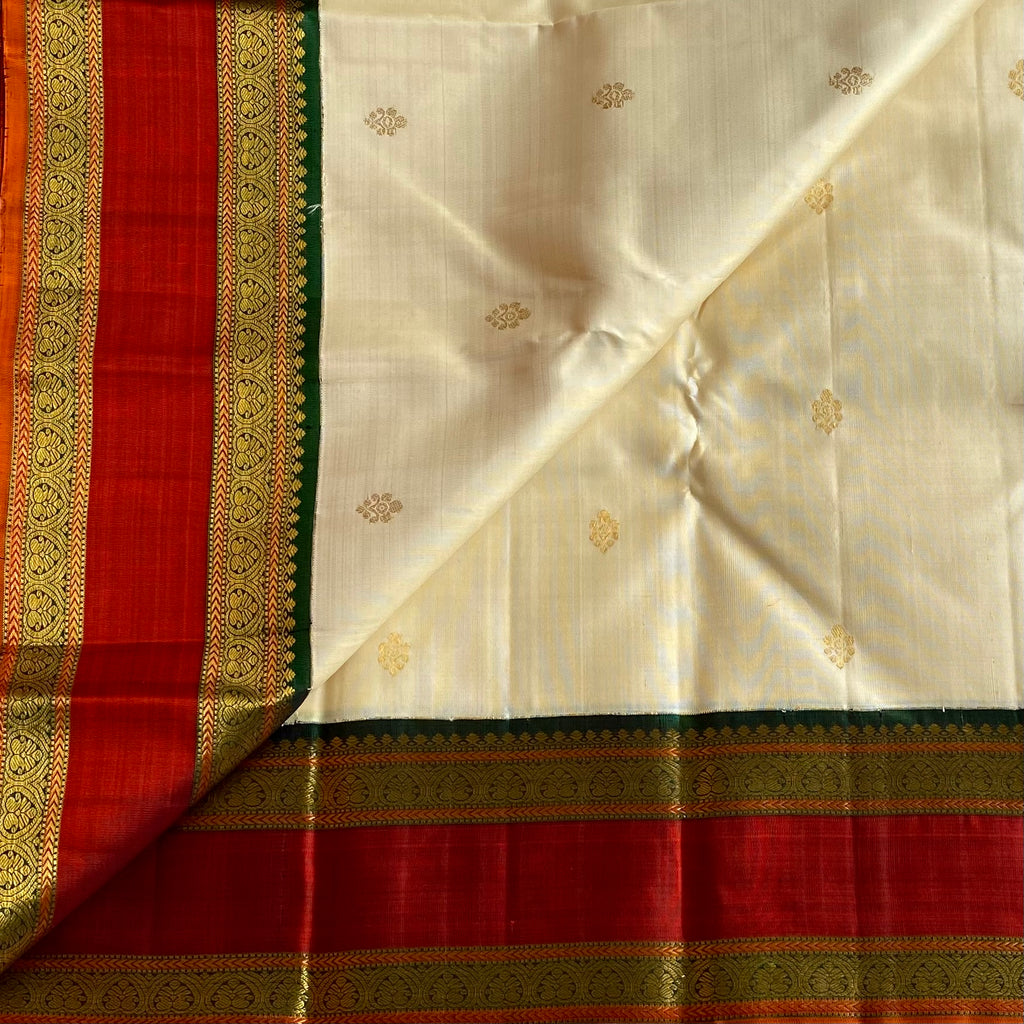 Ivory Kanjeevaram Pure Zari Silk Saree With Deep Green & Rust Pallu