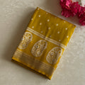 Elegant Mustard Gold Paisley Brocade Saree with Tassels and Borders