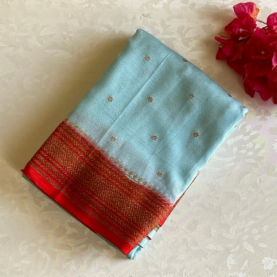 Powder Blue Banarasi Crepe Silk Saree With Scarlet Red Pallu