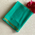 Sea Green Mysore Crepe Silk Saree With Metallic Gold Border