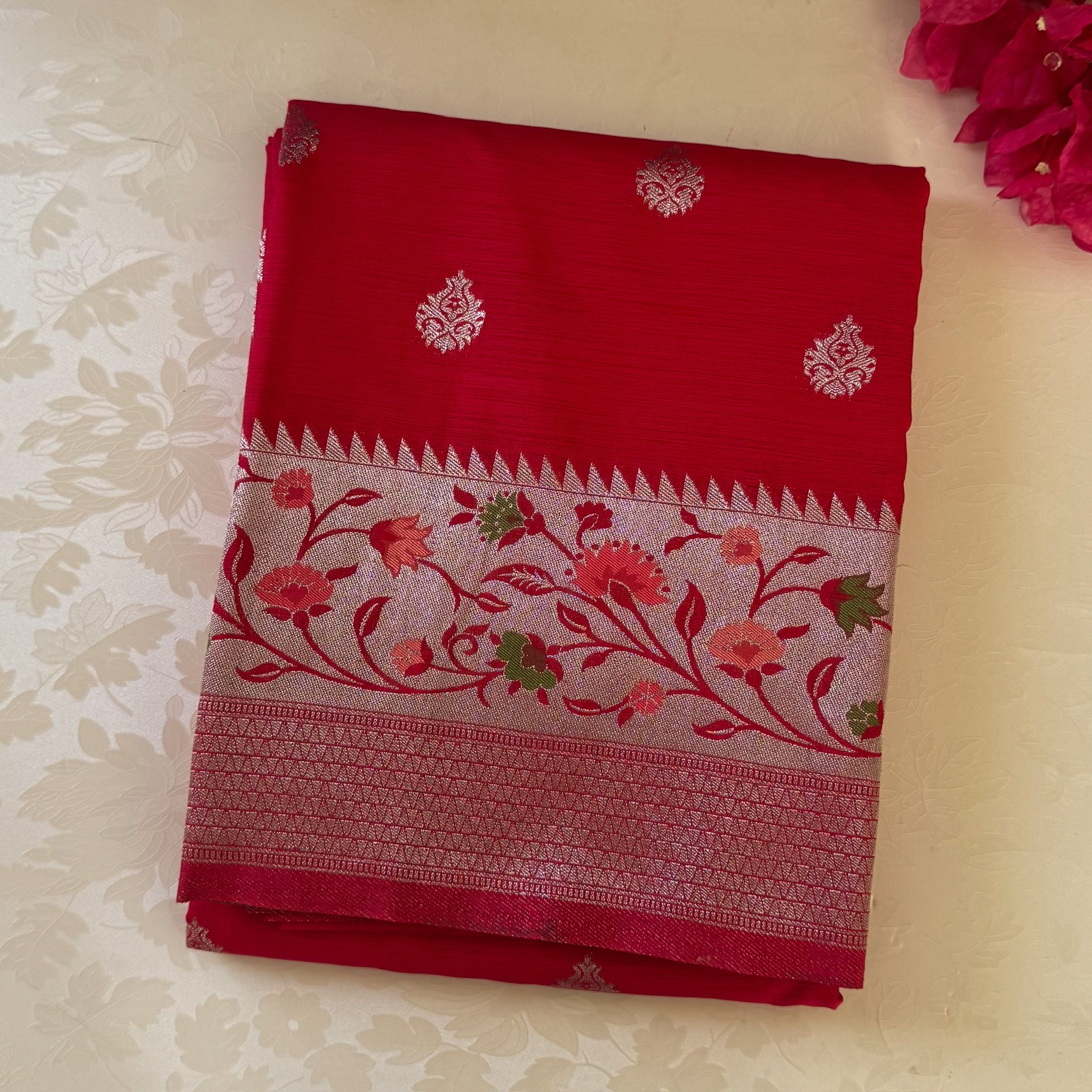 Fuchsia Brocade Silk Saree With Golden Floral Pallu And Tassels