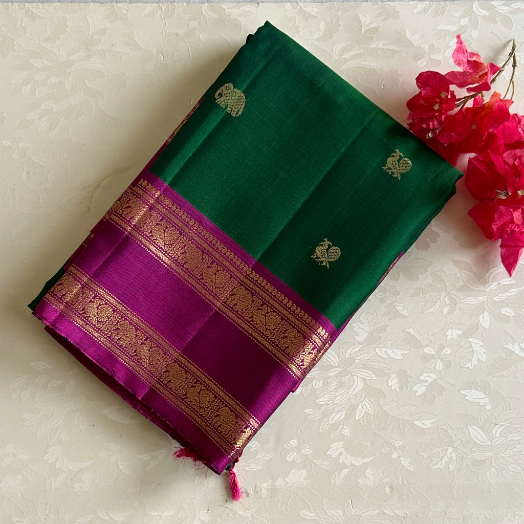 Rich Emarald Green Designer Pure Silk with Dreamy Magenta Contrast Pallu Elephant Buttas