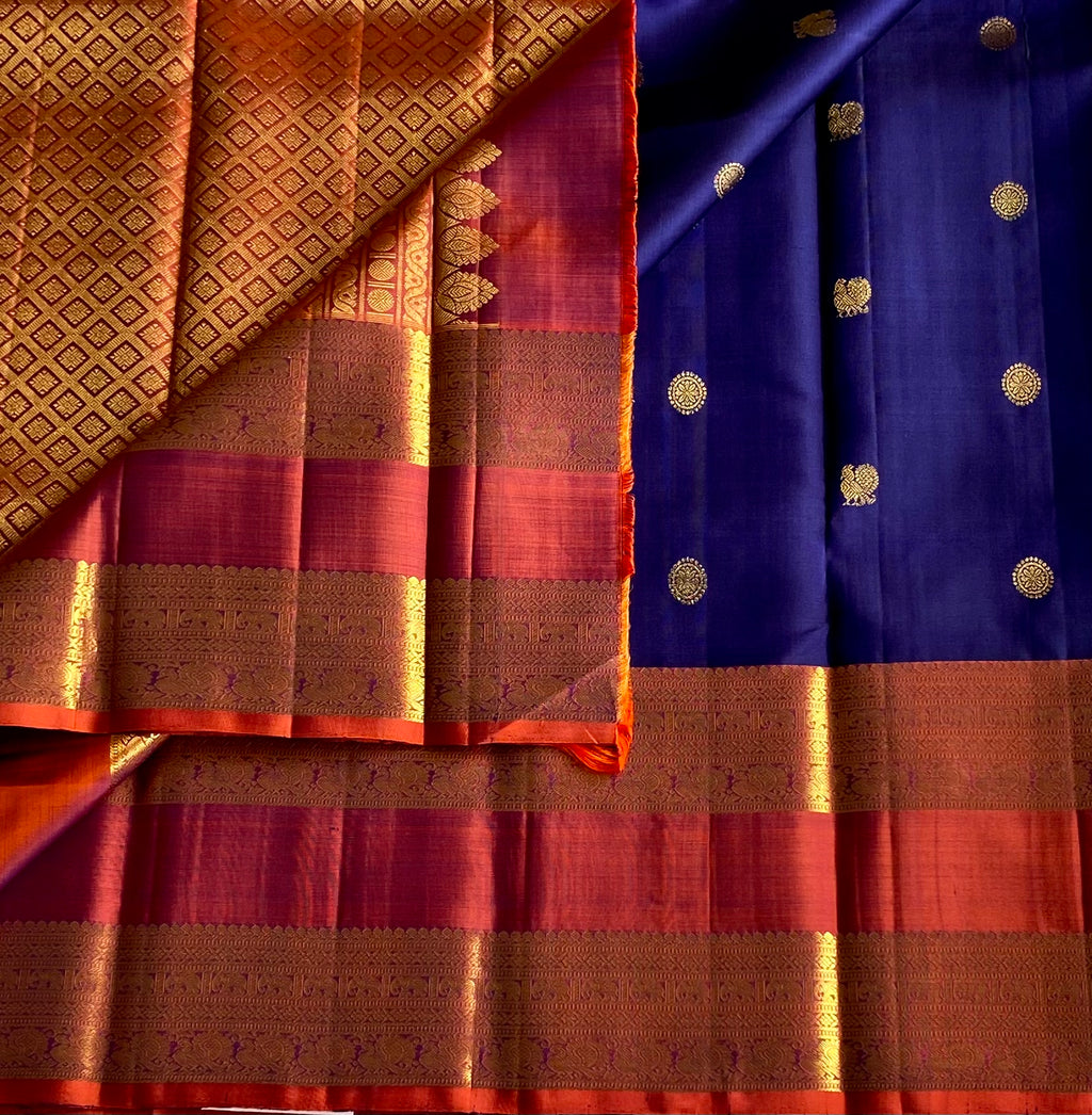 Master weave Rich Blue with dual shaded rust retta pett borders Kanjeevaram stunner