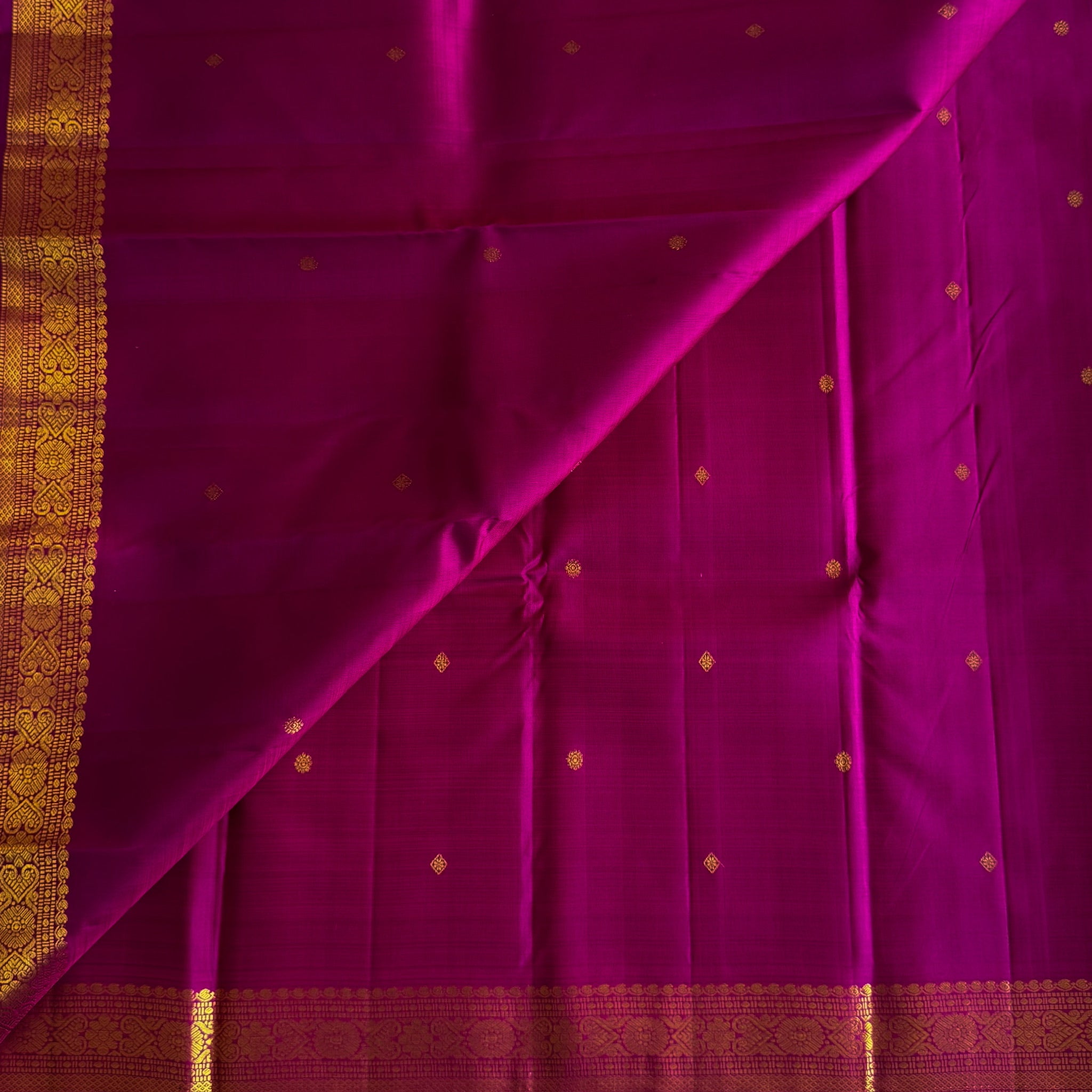 Rich Magenta Kanjeevaram silk with designer Gold Zari Border and Pallu