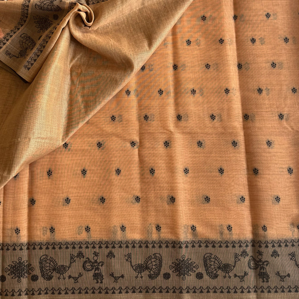 Elegant Muted Apricot Printed Tribal Pallu Saree With Tassel Border