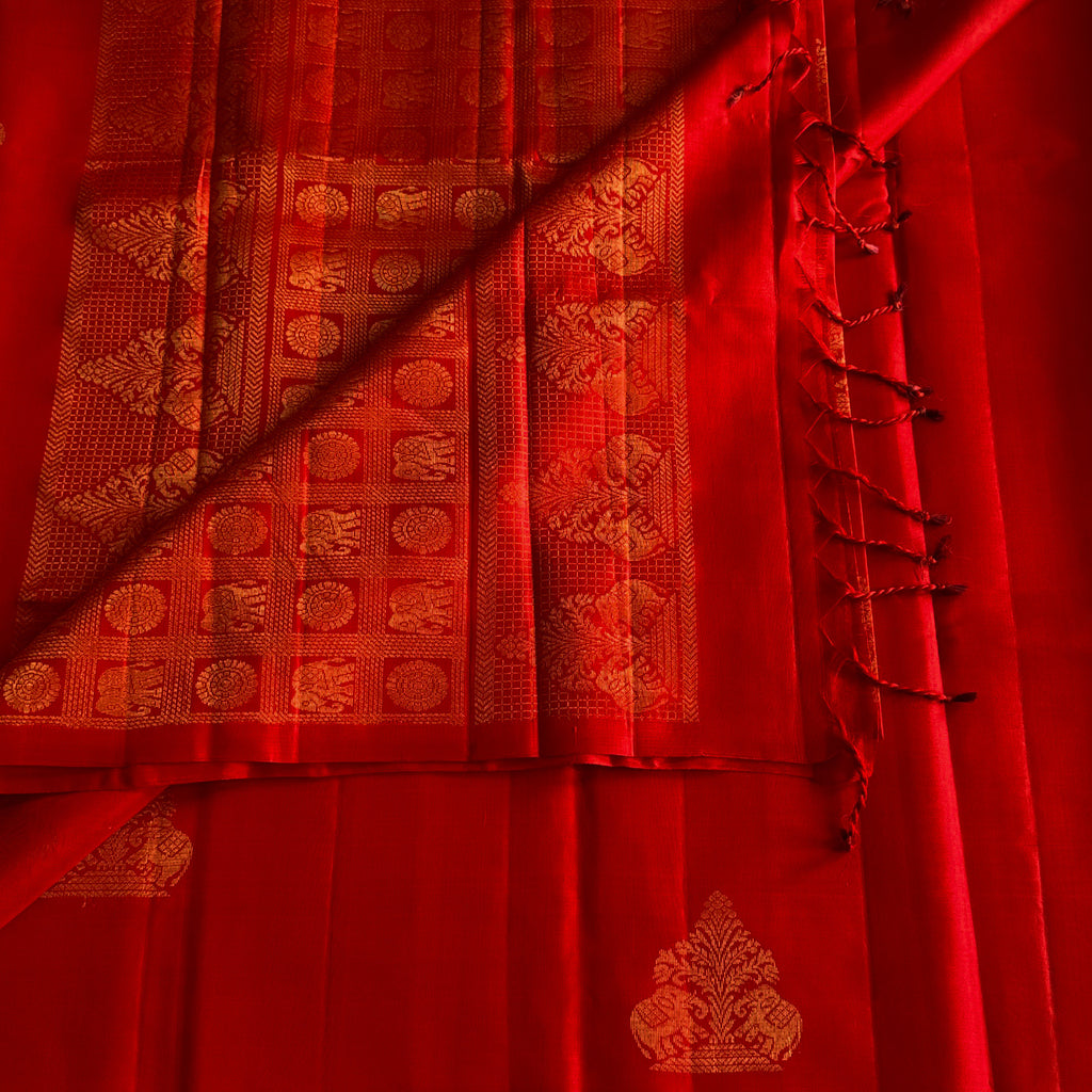 Scarlet Red Saree with Gold Woven Motifs and Tassels