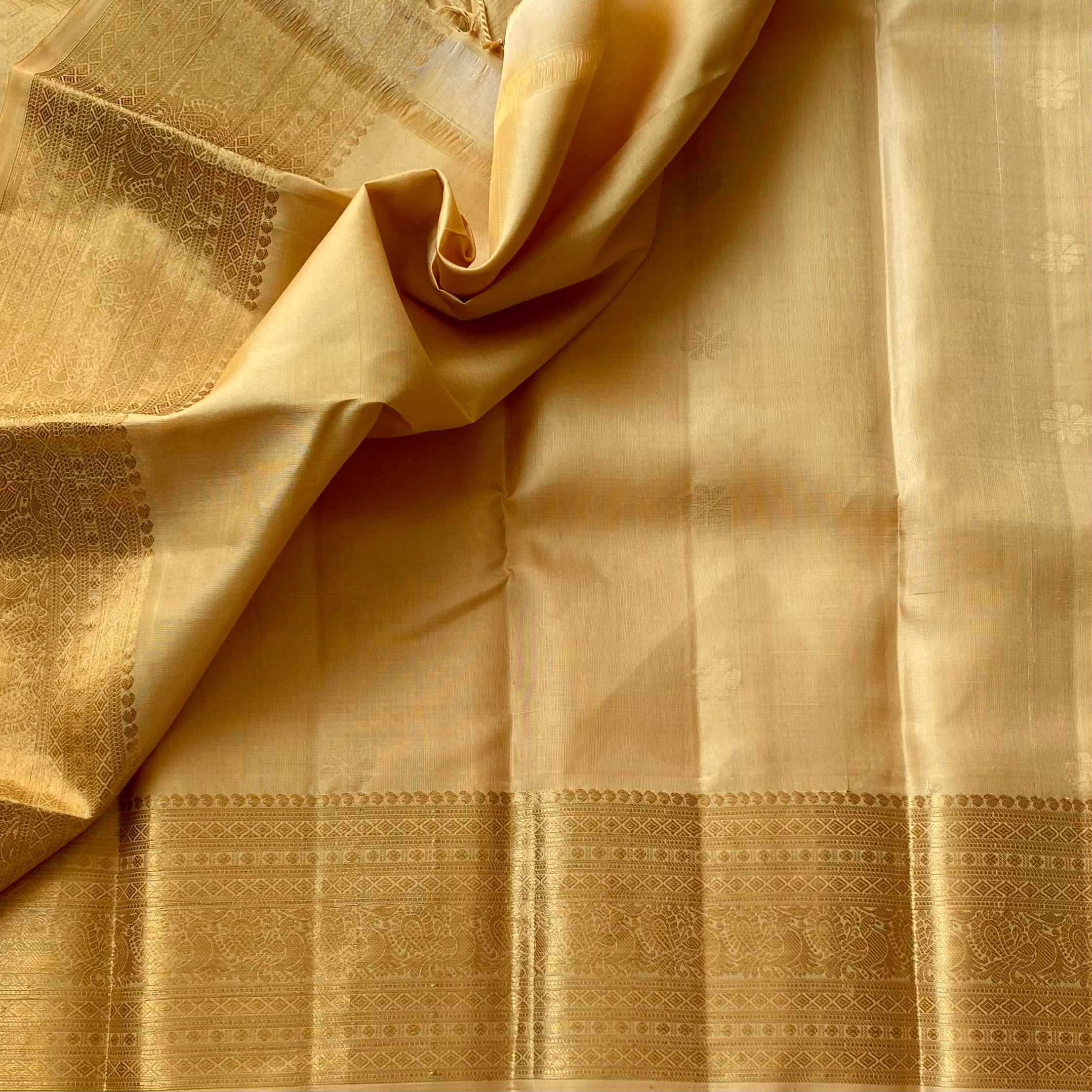 Traditional Champagne Gold Woven Zari Saree With Intricate Jacquard Border